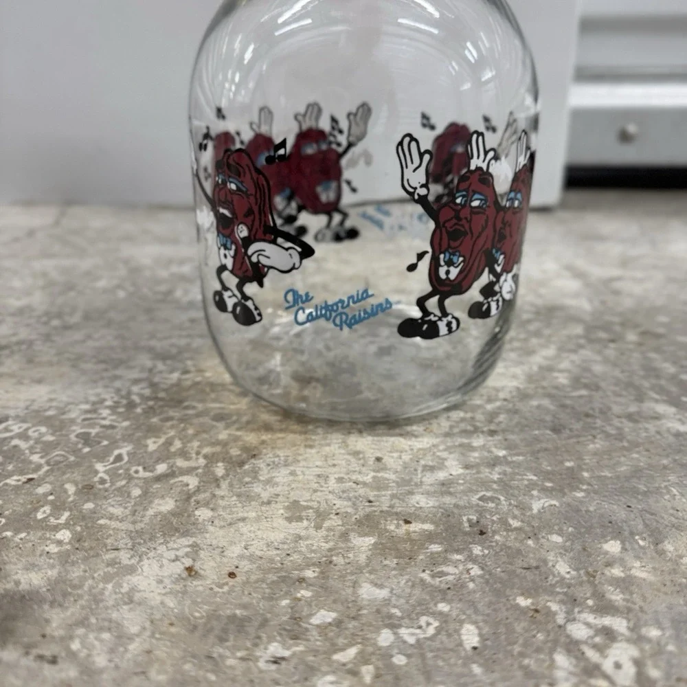 1989 Lot California Raisins Glass Carafe w Lid + 2 Christmas PVC Figures Vintage